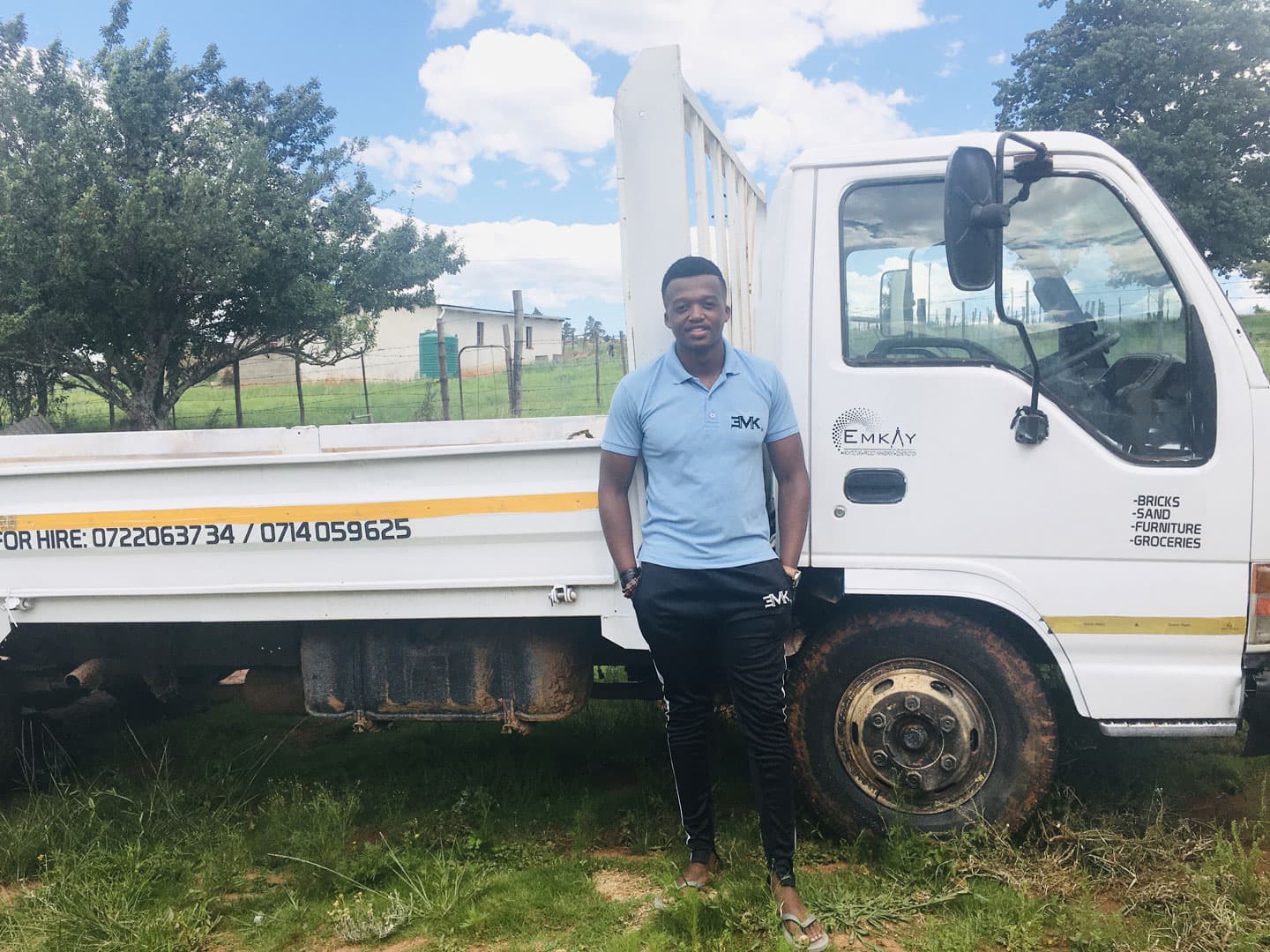 Founder of Emkay Architecture with his construction truck
